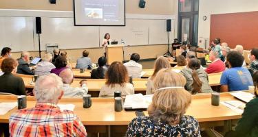 Anna Michalak addresses the retirement symposium for Joe Berry